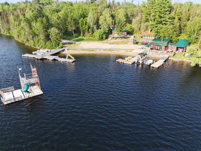 Cuttle Lake Resort, aerial still, 2026-07-10: the waterfront, the docks and the swimming raft