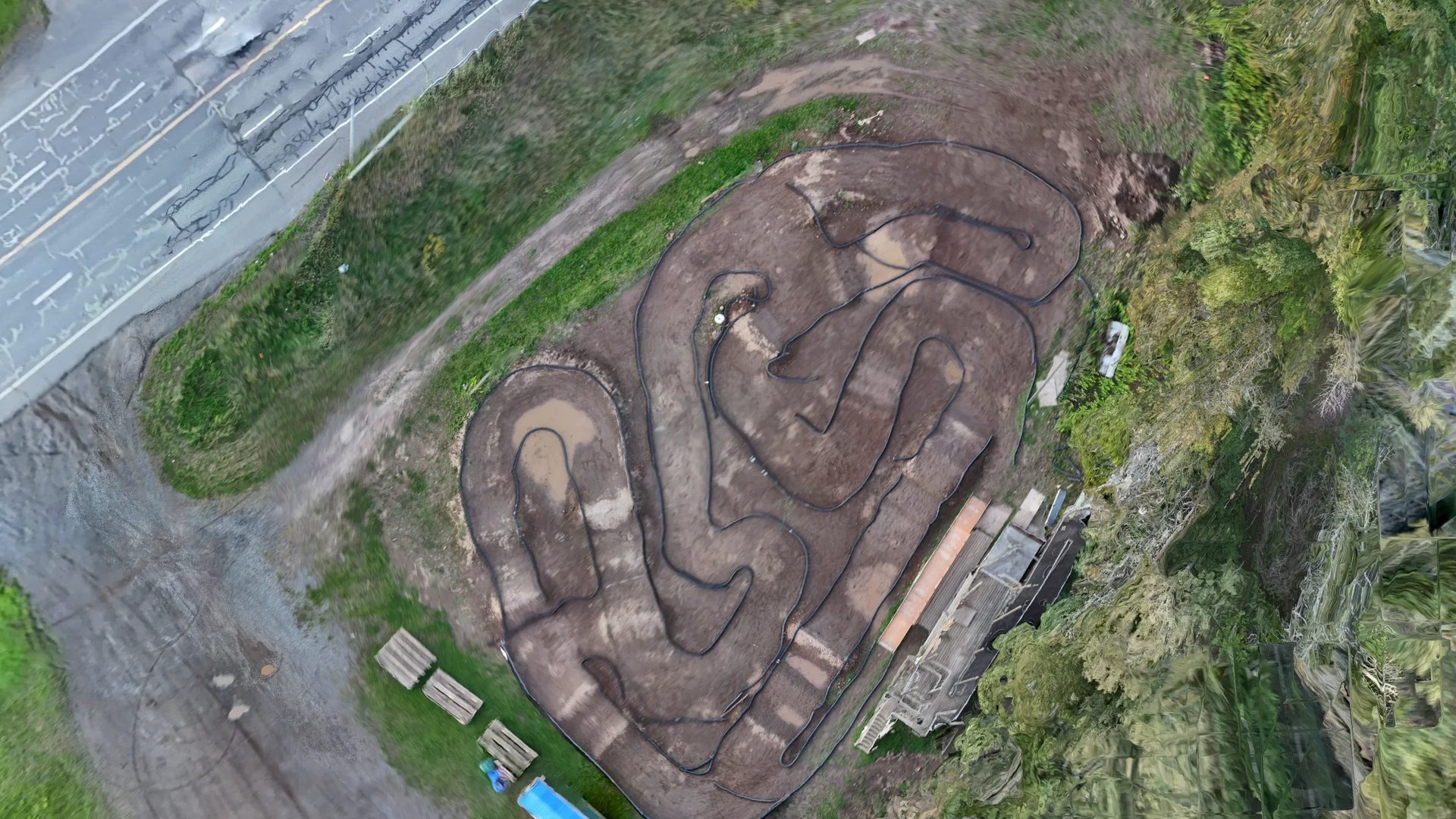 LRCCC Speedway orthomosaic, Thunder Bay, flown 2026-09-15 at 1.00 cm ground sample distance: the dirt track, the paddock and the edge of the highway seen straight down